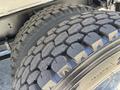 Close-up view of rugged tires on a 2008 International DuraStar showing deep treads designed for traction and durability
