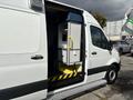 A 2020 Mercedes-Benz Sprinter 2500 with an open side door showing interior storage and equipment compartments