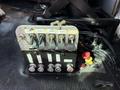 A control panel featuring multiple switches and buttons used for operating various functions of a 1996 Kenworth T800 truck