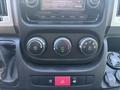 The dashboard controls of a 2020 RAM ProMaster 3500 featuring temperature dials a digital display and several buttons including an ESC option and an emergency button