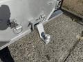 A towing hitch mounted on the back of a silver 2017 Ford F-650 Super Duty