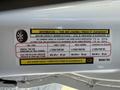 Tire and loading information sticker for a 2021 RAM Promaster detailing seating capacity and tire pressure specifications