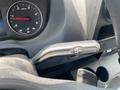 Close-up of the gear shift lever in a 2024 Mercedes-Benz Sprinter with R N D markings