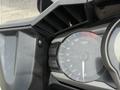 Close-up of the dashboard of a 2016 Yamaha FJR1300AE showing the tachometer and controls with the needle positioned near 9 and indicators for TCS and reset