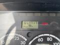 Odometer display of a 2010 Freightliner M2 106 showing 65771.7 kilometers and 140 volts