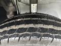 Close-up of a tire from a 2023 RAM Promaster 3500 showing detailed tread pattern and wear indicators