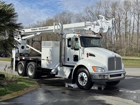 A white 2008 Kenworth T370 bucket truck with a Terex Telelect aerial work platform mounted on the truck bed