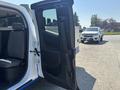 A 2017 Chevrolet Colorado with the driver's side door open showcasing the interior and seating area