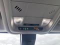 Overhead console of a 2022 Chevrolet Equinox featuring interior lights and controls for airbags and other functions