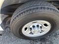 A close-up of a black tire with a silver rim from a 2017 Chevrolet Express featuring the Hercules brand name on the sidewall