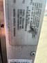 Label plate of a 2012 Ford Econoline displaying vehicle identification information and specifications