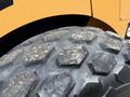 Close-up of a large tire with a hexagonal tread pattern from a 2020 Hyundai HR110C machinery