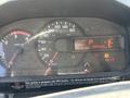 Dashboard of a 2015 Hino 195 showing speedometer fuel gauge and various indicator lights with the odometer reading 199433 km