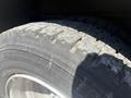 Close-up of a worn tire on a 2009 Workhorse W62 showing tread patterns and sidewall details