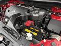 A 2016 Mitsubishi Outlander engine compartment featuring a V6 engine air intake and a red battery with warning labels