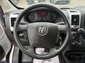 Steering wheel of a 2020 RAM Promaster with the logo visible and control buttons attached