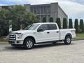 2017 Ford F-150 pickup truck in white with chrome accents and four-door cab design