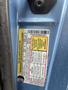 A 2009 Ford Econoline vehicle identification label showing specifications and loading information
