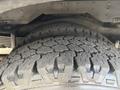 Close-up of a tire on a 2020 Chevrolet Express showing detailed tread pattern and sidewall texture
