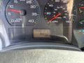 Dashboard of a 2006 International 4300 showing speedometer, tachometer, and digital display indicating RND421 and 8042 hours