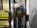 A thermal imaging device mounted on a metal frame inside a 2023 Ford Transit