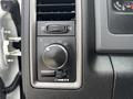 Control panel with knobs and buttons for lights and ventilation in a 2016 RAM 5500