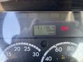 A dashboard display of a 2005 Freightliner M2 106 showing an engine hour meter reading 11136.4 hours with a warning light indicator illuminated