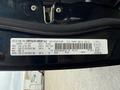 A 2013 Dodge Journey vehicle identification label with manufacturer details and specifications