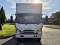Front view of a white 2016 Isuzu NRR box truck with an empty cargo area and clear windshield