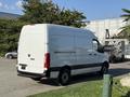 2020 Mercedes-Benz Sprinter van in white parked with a smooth exterior and a rear cargo door visible