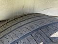 Close-up of a tire from a 2016 Mercedes-Benz Sprinter showing tread patterns and surface details