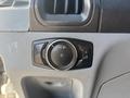 A control knob for adjusting headlights and dashboard lighting in a 2017 Ford Transit-350