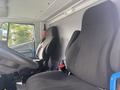 Interior view of a 2020 Lion Lion6 showing two black fabric bucket seats and the steering wheel