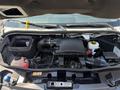 The engine compartment of a 2019 Mercedes-Benz Sprinter with visible components including the air intake hose coolant reservoir and various hoses and cables
