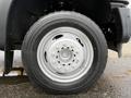 The image shows a close-up of a white rim with multiple bolts mounted on a black tire labeled XDS 2 from Michelin designed for a 2012 Ford F-550