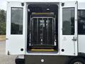 The image shows the rear entrance of a 2020 Chevrolet Express with an open lift platform for wheelchair accessibility