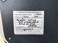 A vehicle inspection label for a 2011 Autocar Xpeditor with details of the inspection date and vehicle information