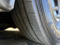 Close-up of a tire tread from a 2016 Grande West Vicinity bus showing tread depth and texture
