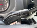 Close-up of a gear shift lever from a 2020 Mercedes-Benz Sprinter 2500 displaying positions for reverse neutral and drive
