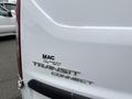 A white 2017 Ford Transit Connect van with a logo on the rear door displaying the name "MAC" and "Transit Connect" in silver lettering