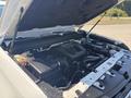 The engine compartment of a 2017 Chevrolet Colorado showing the engine block and surrounding components including air intake and coolant reservoir