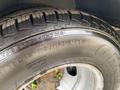 Close-up of a 2020 Chevrolet Express tire showing its tread pattern and specifications on the sidewall