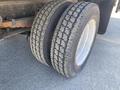 Close-up of the dual rear tires of a 2014 International TerraStar showing tread pattern and wheel rim