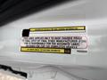 Label on a 2023 RAM Promaster 3500 providing incomplete vehicle tire and loading information and instructions for final stage manufacturer