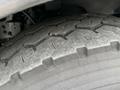 Close-up of a worn tire tread on a 2006 Sterling L7500 vehicle showing distinct grooves and patterns