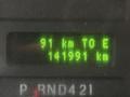 Display panel of a 2018 Ford E-450 showing distance to empty as 91 km and total distance traveled as 141991 km