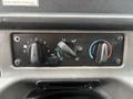 Control panel with three dial knobs for fan speed temperature and airflow direction on a Freightliner M2 106 vehicle