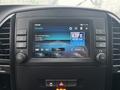 2021 Mercedes-Benz Metris dashboard display showing a digital screen with radio information and controls