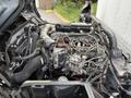 A 2018 Hino 195 engine with various components including hoses wires and a visible air intake system