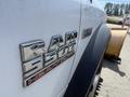 Close-up of the RAM 5500 emblem on a white truck showcasing the words RAM 5500 and HEAVY DUTY